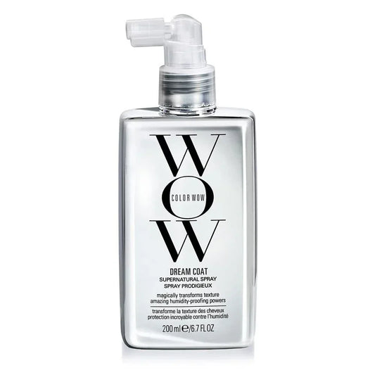 Clear bottle of WOW Dream Coat Supernatural Spray on a white background